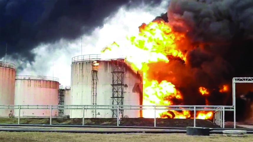 A still image taken from video footage shows a fuel depot on fire in the city of Belgorod, Russia on Friday.