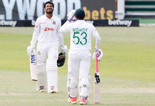Mahmudul Hasan Joy (left) of Bangladesh acknowledges his maiden century to the crowd during the third day of the first Test against South Africa at Kingsmead in Durban of South Africa on Saturday.