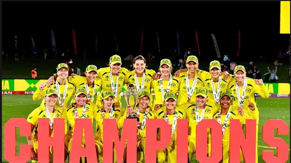 Australian team celebrate their victory with the trophy after the 2022 Women's Cricket World Cup final match between England and Australia at the Hagley Park Oval in Christchurch on Sunday.