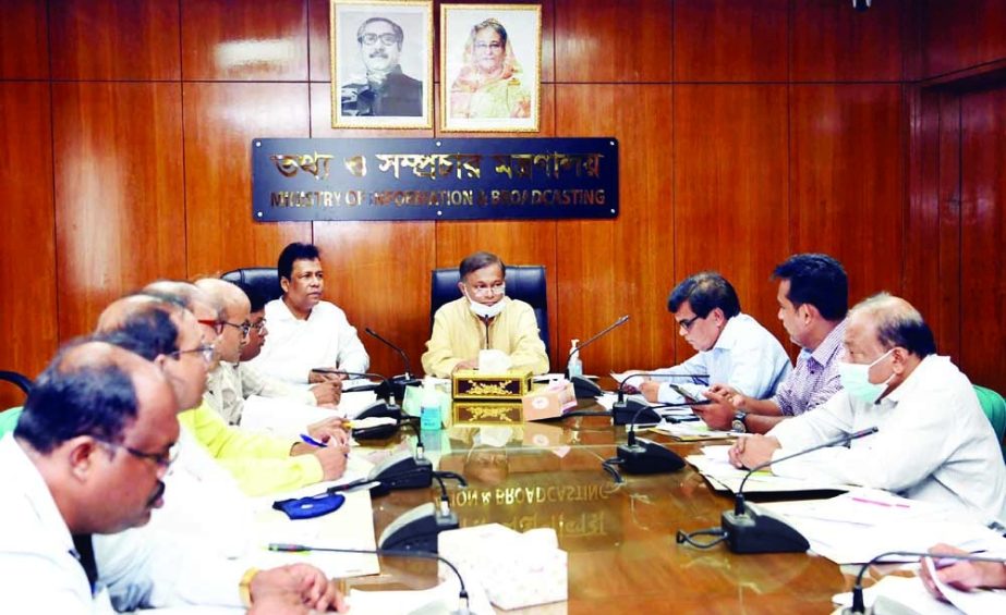 Information and Broadcasting Minister Dr Hasan Mahmud presides over the regular meeting of journalists welfare trust at the Ministry conference room on Sunday. NN photo