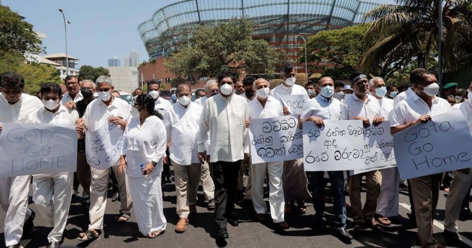 Sri Lankan opposition alliance marches towards Independence Square as they shout slogans against President Gotabaya Rajapaksa in Colombo on Sunday.