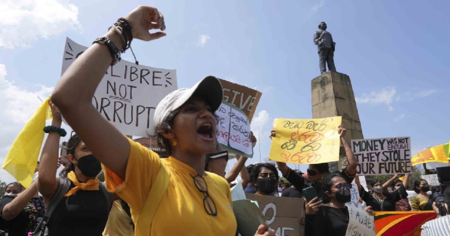 Sri Lankans protest demanding president Gotabaya Rajapaksa resign in Colombo, Sri Lanka, Monday, April 4, 2022.
