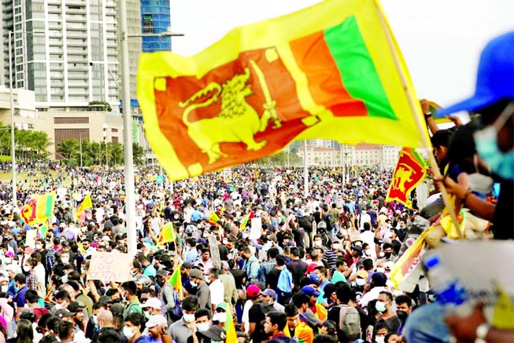 People shout slogans against Sri Lanka's President Gotabaya Rajapaksa during a protest in front of the Presidential Secretariat amid the country's economic crisis, in Colombo on Sunday.