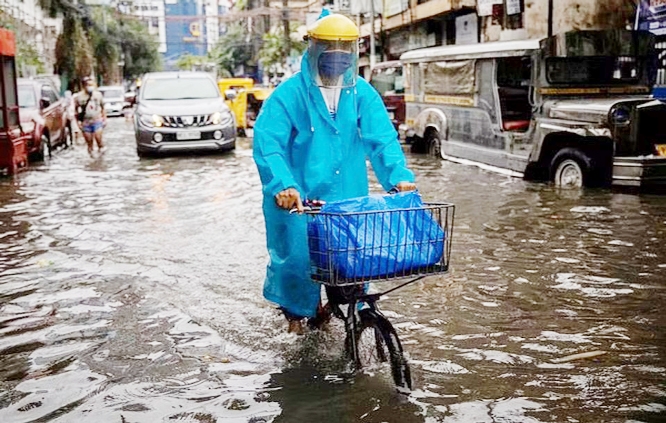 Sea storm floods Philippines urban areas also.
