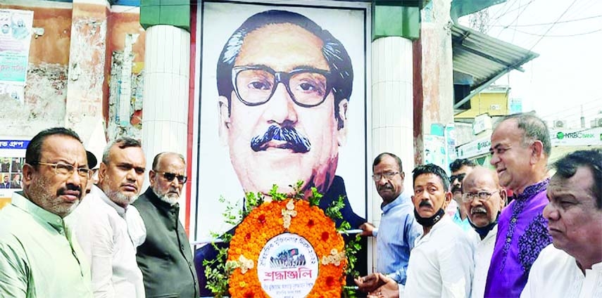 ISHWARDI (Pabna): Nuruzzaman Biwas MP with other Awami Leagues place wreath at the mural of Bangabandhu marking the Mujibnagar Day on Sunday.