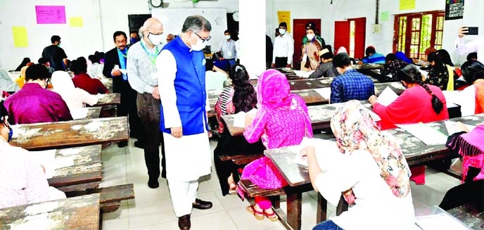 Health Minister Zahid Maleque visits an examination hall for the admission test of BDS at Government Titumir College in the city on Friday.