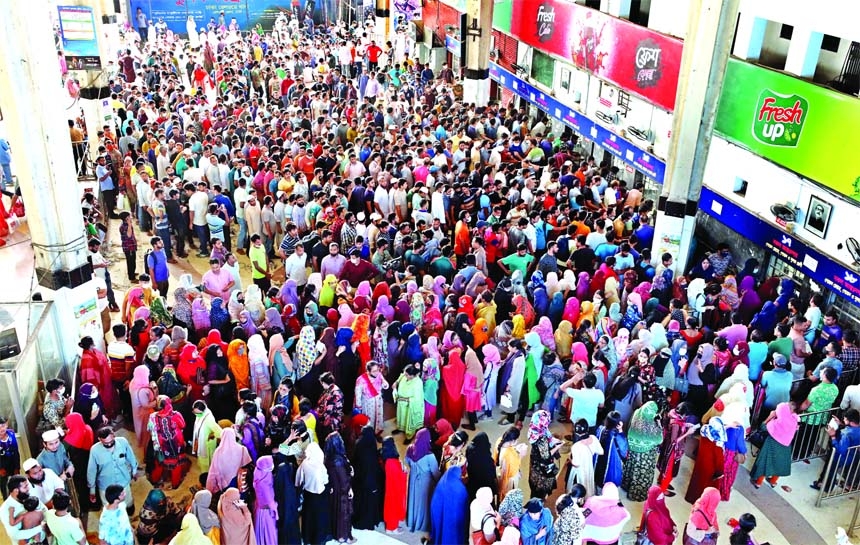 Huge crowd gather at Kamalapur Railway Station in the capital on Friday to buy train tickets for going home to celebrate Eid ul-Fitr.