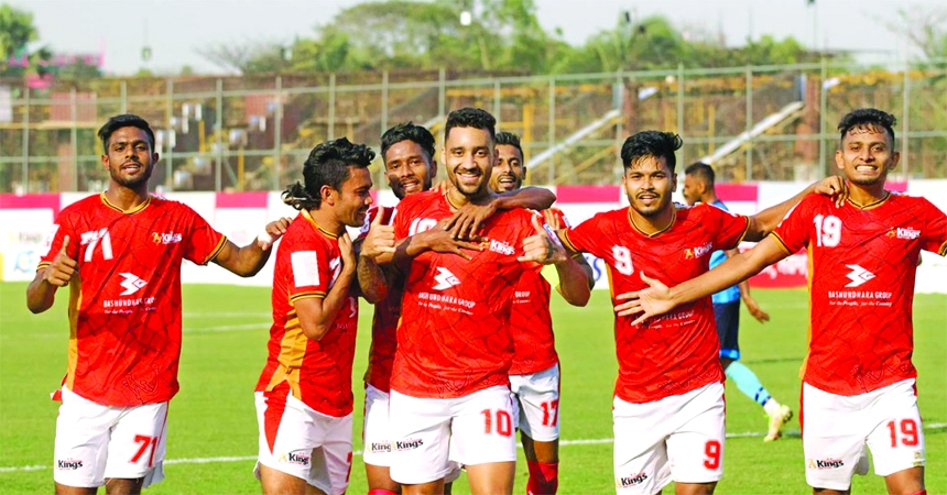 Players of Bashundhara Kings celebrate after winning their match of the TVS Bangladesh Premier League Football.