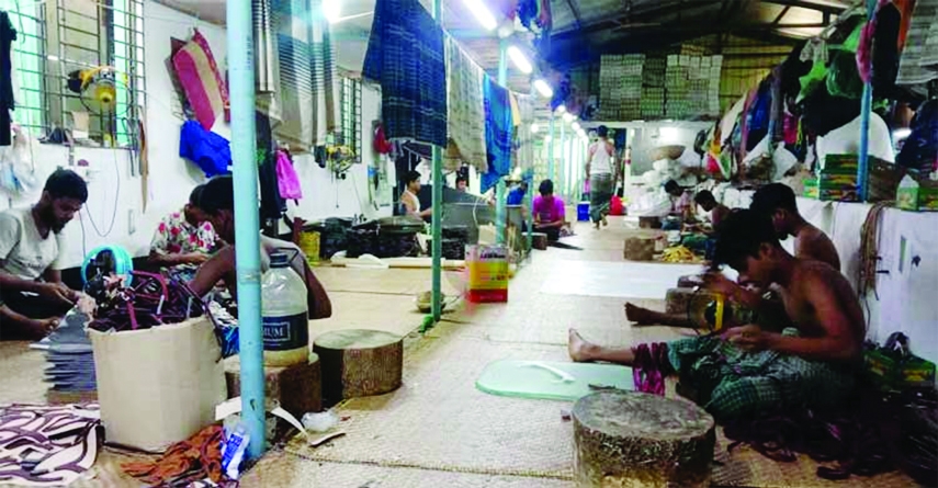 KISHOREGANJ : Shoemakers are busy their products ahead of Eid in Bhairab as Bhairab 's Shoemakers make 3 lakh pair of shoes daily ahead of Eid.