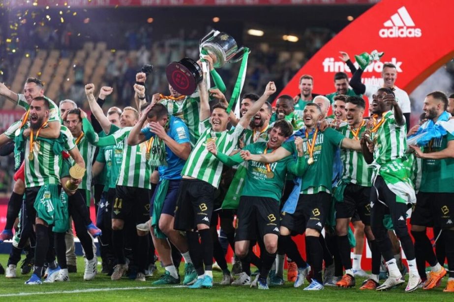 Real Betis' players celebrate their victory after winning the Spanish Copa del Rey (King's Cup) final football match between Real Betis and Valencia CF at La Cartuja Stadium in Seville on Saturday. Agency photo