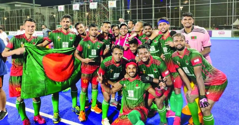 Members of Bangladesh Hockey team pose for a photo session after becoming the champions of the AHF Cup Hockey in Indonesia recently. File photo