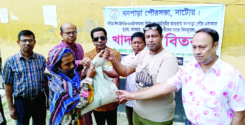 BARIGRAM (Natore): KM Zakir Hossain, Municipal Mayor inaugurates rice distribution programme at Bonpara Degree College ground on Wednesday. Former state minister and District Awami League President Prof Abdul Quddus MP visited the programme.