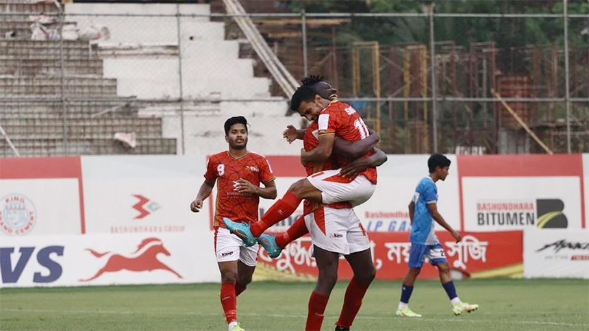 Players of Bashundhara Kings celebrate after scoring a goal against Uttar Baridhara Club in their match of the TVS Bangladesh Premier League Football at Bashundhara Sports Complex in the city on Friday.