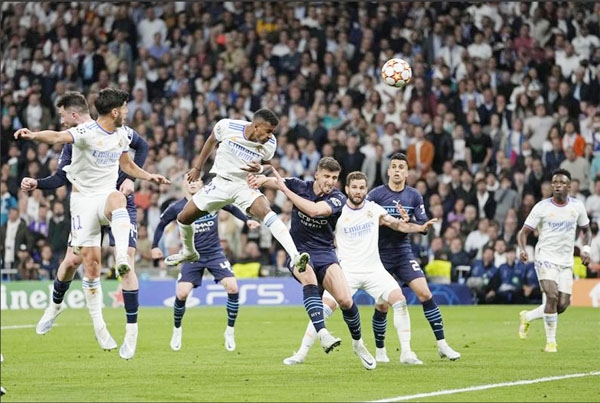 Real Madrid's Rodrygo (3rd from left) scores his side's second goal during the Champions League semi-final, second leg, soccer match between Real Madrid and Manchester City at the Santiago Bernabeu stadium in Madrid, Spain on Wednesday.