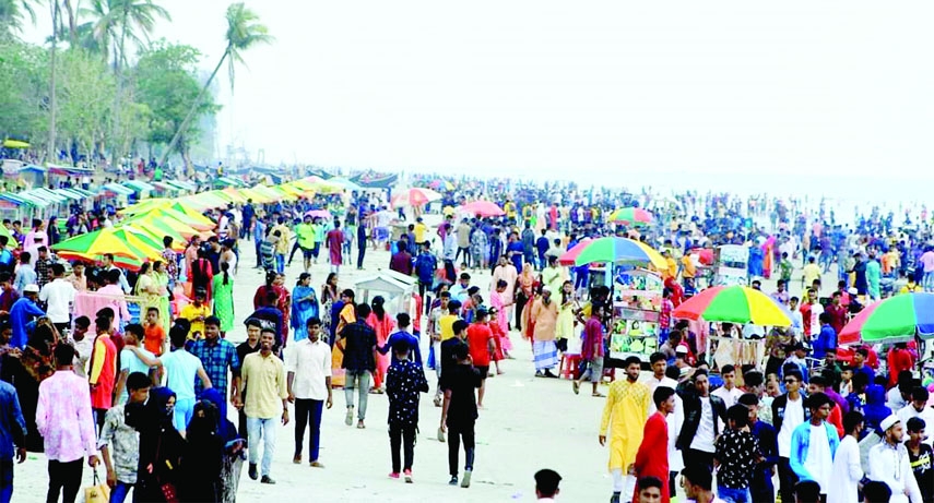 KALAPARA (Patuakhali): People enjoy Eid- ul- Fitr holidays at Kuakata Sea beach in Kalapara Upazila. The snap was taken on Thursday.
