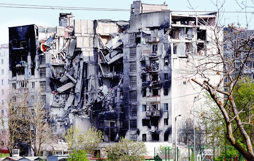 A view shows a residential building destroyed during Ukraine-Russia conflict in the southern port city of Mariupol, Ukraine on Thursday.