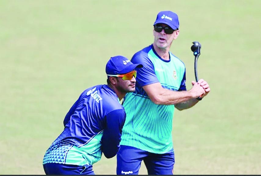 Batting Coach of Bangladesh Cricket team Jamie Siddons (right) and Shakib Al Hasan during a practice session recently.