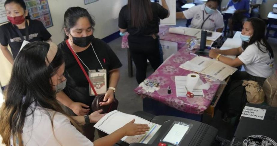 People vote during the opening of elections on Monday May 9, 2022 in Quezon City, Philippines. Ap photo