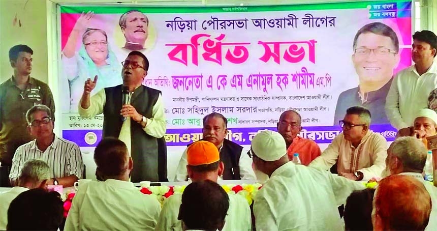 Deputy Minister for Water Resources AKM Enamul Haque Shamim speaks at the extended meeting of Pourashava Awami League of Naria in Shariatpur on Friday.