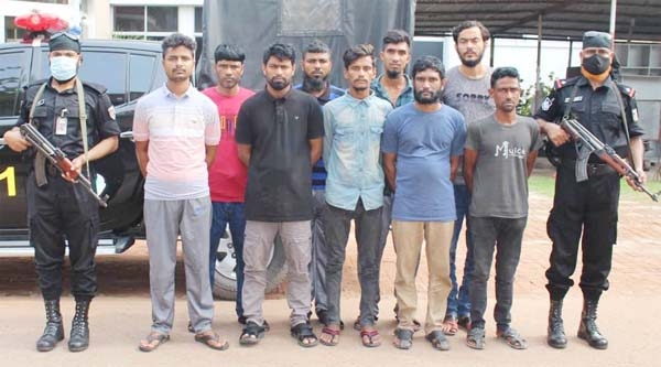 RAB-11 detains nine members of a gang of dacoit with sharp weapons and cocktail conducting raid at Araihazar area in Narayanganj on Thursday.