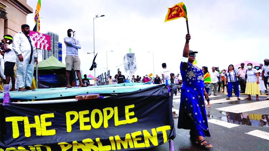 Sri Lankans protest demanding president Gotabaya Rajapaksa resign and decrying the appointment of Prime Minister Ranil Wickeremesinghe in Colombo, Sri Lanka on Friday.