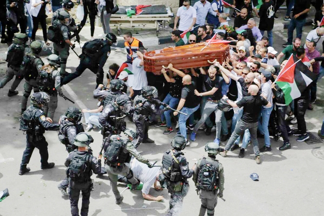 Israel Police charging journalist Shirin Abu Akleh's funeral procession in Jerusalem to draw worldwide condemnation on Saturday.