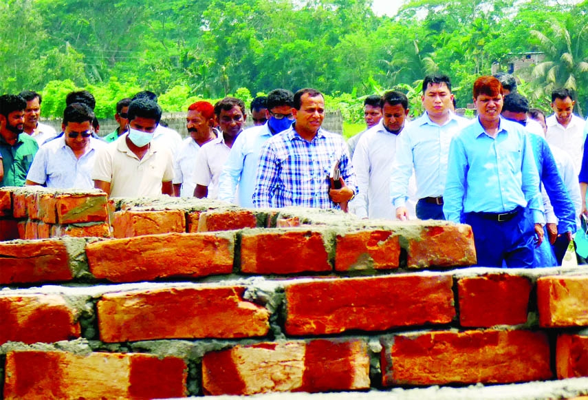 BORHANUDDIN (Bhola): Tawfiq-E-Lahi Chowdhury, dc, Bhola visits 142 houses of the third phase of the shelter under construction project as a gift from PM among the homeless at Borhanuddin in Bhola on Sunday.