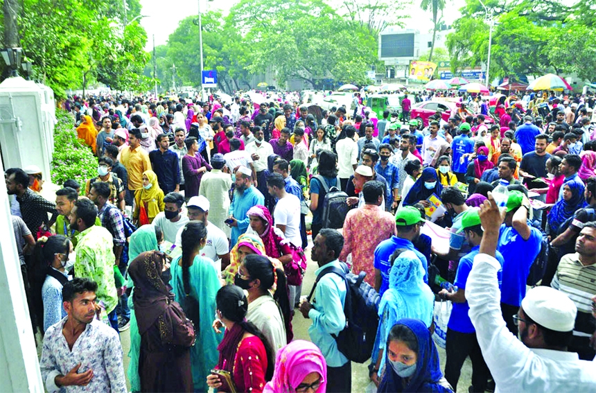 Thousands of job seekers gather at a centre at Law Faculty of Dhaka University to attend recruitment test on Friday amid rising unemployment among educated youths.