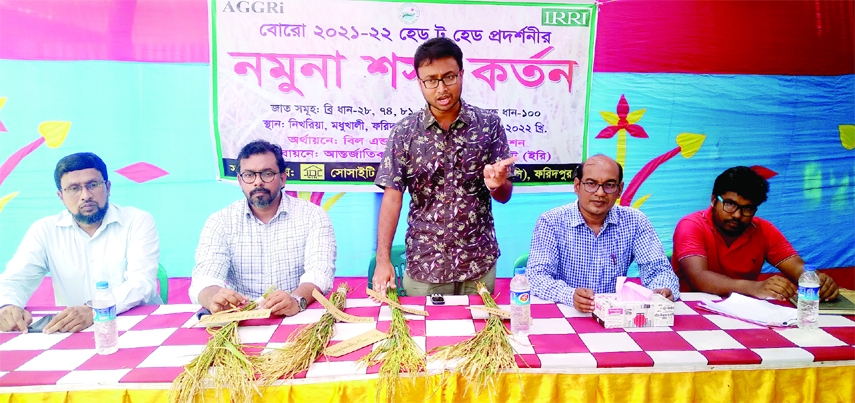 MADHUKHALI (Faridpur): Agriculturist Alvir Rahman speaks at the sample crop cutting progrmmae at Madhukhali Upazila on Friday.