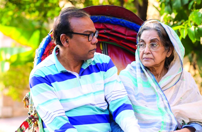 Fazlur Rahman Babu and Dilara Zaman in a scene from drama Manush Ekta Dui Chakkar Cycle