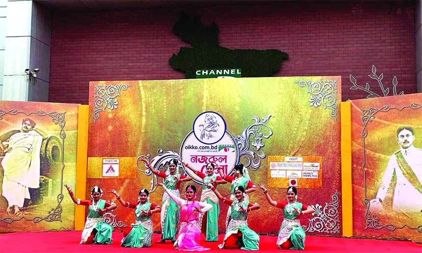 Dance artistes performing at Nazrul Mela on the 123rd birth anniversary of National Poet Kazi Nazrul Islam on the premises of Channel i on Wednesday.