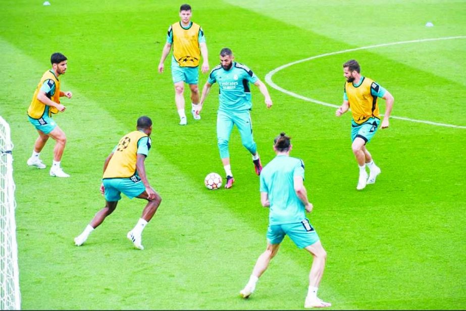 Real Madrid's Karim Benzema (center) and teammates attend a training session in Madrid, Spain on Tuesday, prior to the UEFA Champions League final match against Liverpool. Agency photo