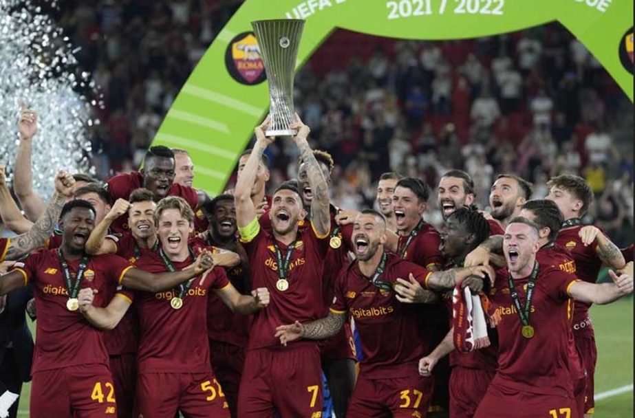Roma players celebrate with the trophy after winning the Europa Conference League final soccer match between AS Roma and Feyenoord at National Arena in Tirana, Albania on Wednesday. AP photo