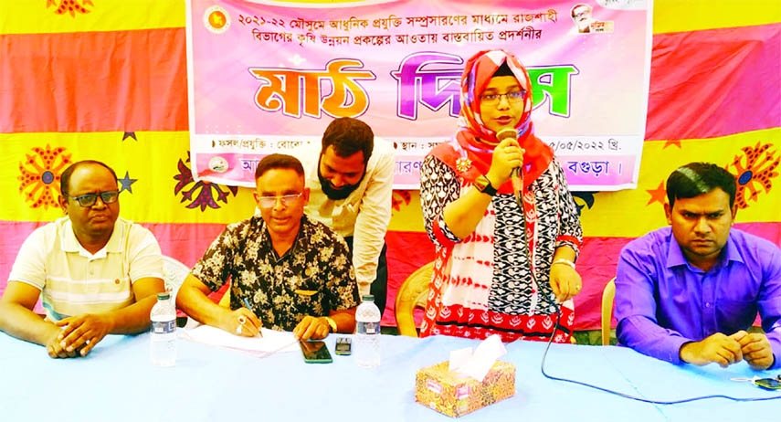 SHERPUR (Bogura): Jannatul Ferdous , Upazila Agriculture Officer speaks at the Field Day of BRRI dhan-89 under Agriculture Development Project of Rajshihi Division at Awalakandi Village in Sughata Union on Wednesday.