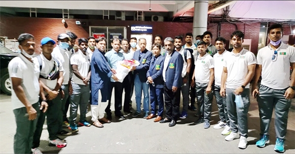 Acting General Secretary of Bangladesh Hockey Federation Mohammad Yousuf receives Bangladesh Hockey team at the Hazrat Shahjalal International Airport on Thursday night.