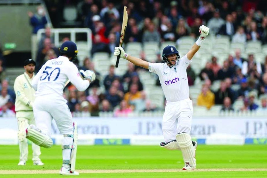 England's Joe Root celebrates winning the Test match against New Zealand with Ben Foakes at Lords on Sunday. Agency photo