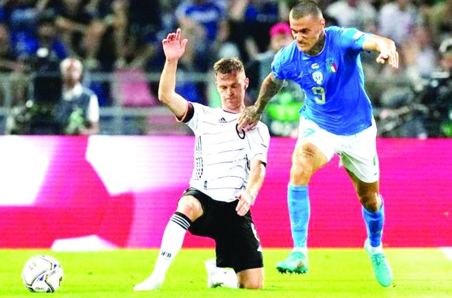 Germany's Joshua Kimmich (left) duels for the ball with Italy's Gianluca Scamacca during the UEFA Nations League matchat Renato Dall'Ara stadium in Bologna, Italy on Saturday. Agency photo