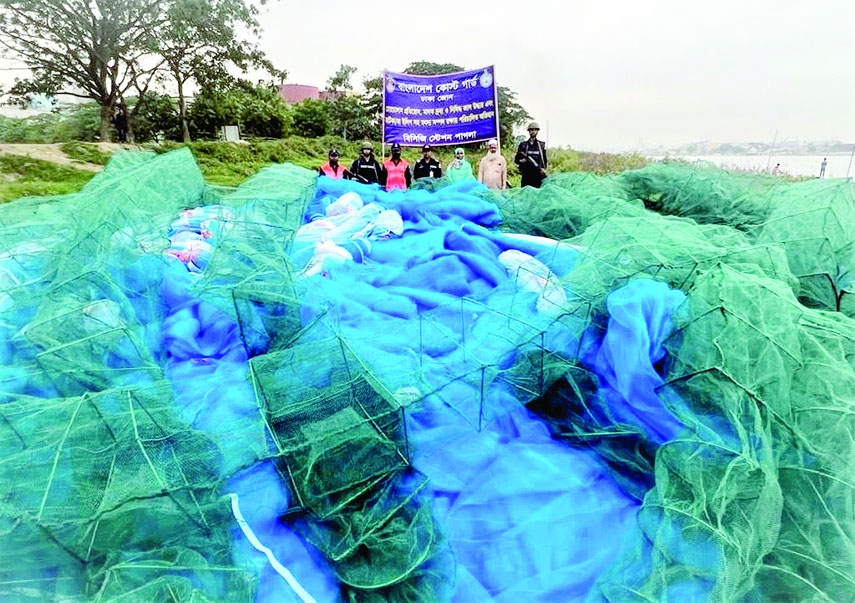 NARAYANGANJ : Different kinds of fishing nets recover by members of Bangladesh Coast Guard from two trawlers in Buriganga River of Pagla Bazar in Fatullah Upazila on Saturday.