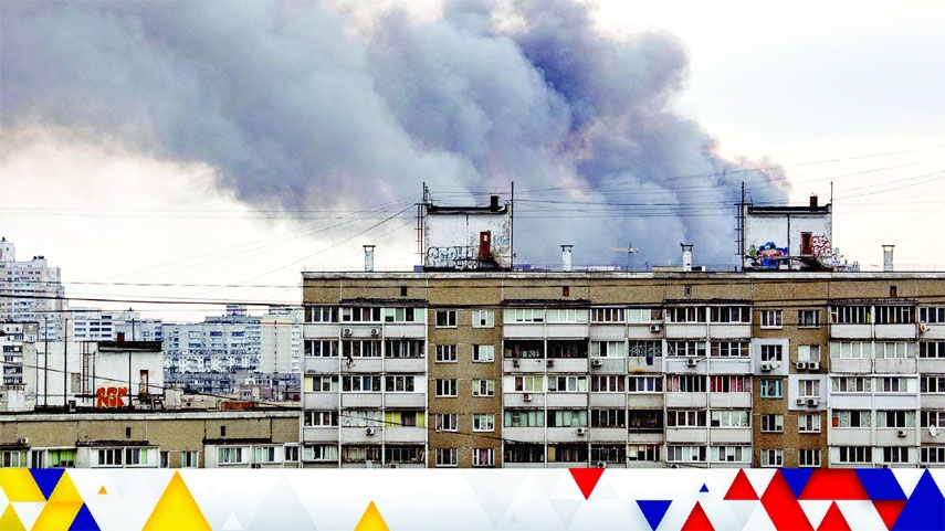 Smoke rises after a missile strikes Kyiv, Ukraine on Sunday in a counter offensive against Russia.