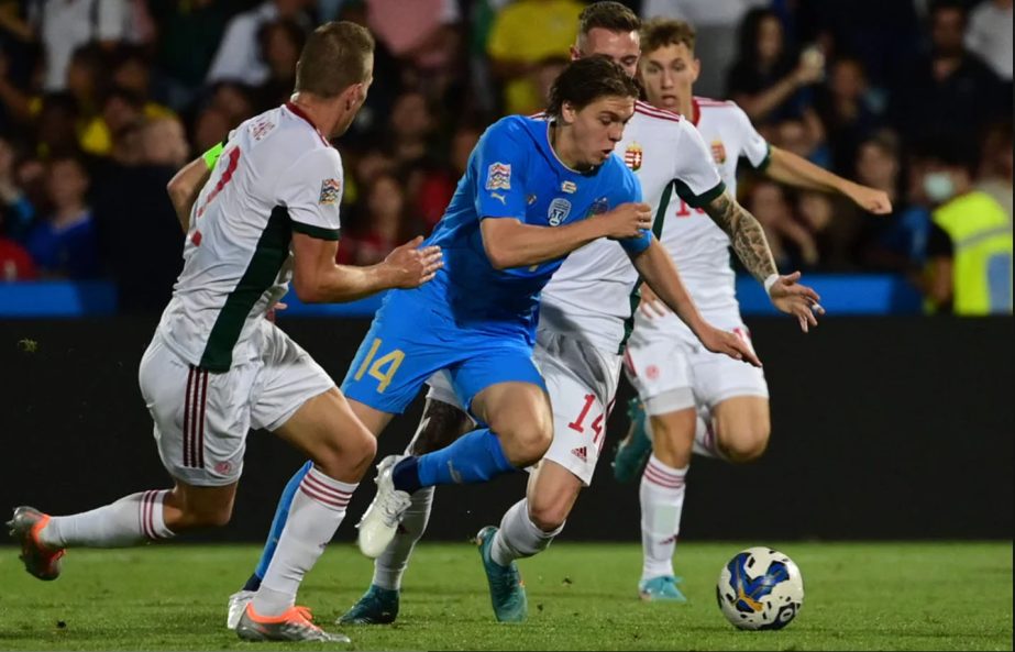 Italy's forward Alessio Zerbin (center) challenges Hungary's defender Adam Lang (left) and Hungary's defender Bendeguz Bolla during the UEFA Nations League football match between Italy and Hungary on Tuesday. Agency photo