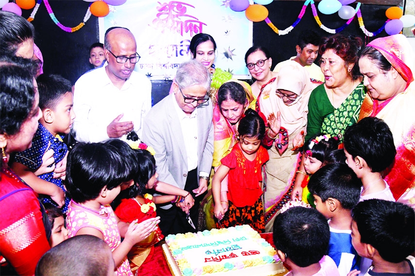 VC of Dhaka University Dr. Akhtaruzzaman cuts cake marking the birthday of late Prof. Dr. Nurunnahar Foyzunnesa, Founder Director of 'Chhayanir Pre School O Shishujatna Kendra', DU in its auditorium on Thursday.