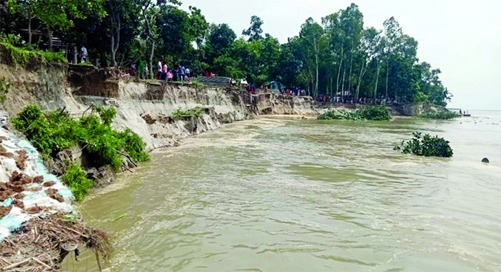 A vast area of South Brahmangram on the bank of the Jamuna River at Chauholi upazila under Sirajganj district gets inundated on Friday triggering heavy erosion due to sudden onrush of hill water.