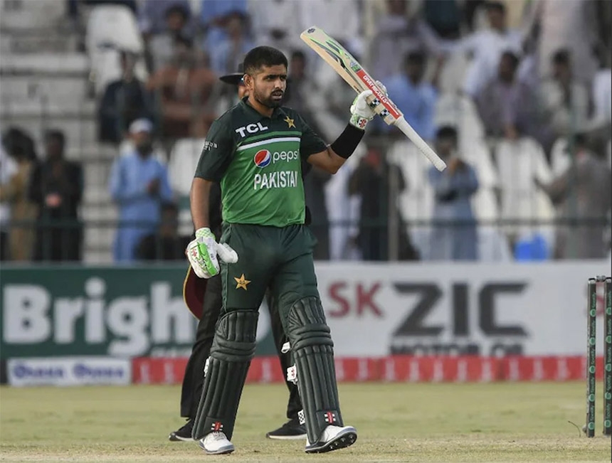 Pakistan's captain Babar Azam raises his bat after scoring a half century during the second one-day international (ODI) cricket match between Pakistan and West Indies at the Multan International Cricket Stadium in Multan on Friday.