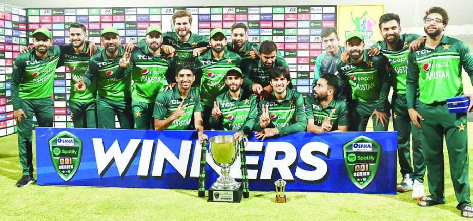 Pakistan's players pose with winning series trophy during a ceremony on the third and final One Day International cricket match between Pakistan and West Indies at the Multan International Cricket Stadium in Multan on Sunday. Agency photo