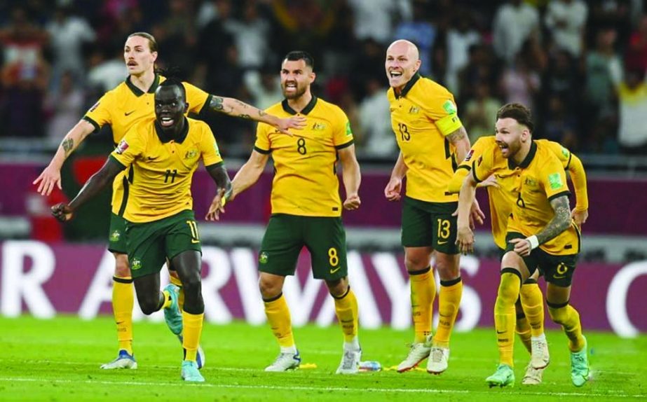 Australia's players celebrate after winning the FIFA World Cup 2022 intercontinental play-offs match against Peru at the Ahmed bin Ali Stadium, Doha, Qatar on Monday. Agency photo