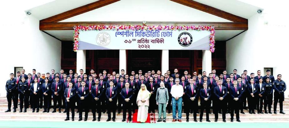 Prime Minister Sheikh Hasina poses for a photo session with the members of Special Security Force at her office on Wednesday marking the 36th founding anniversary of SSF. PID photo