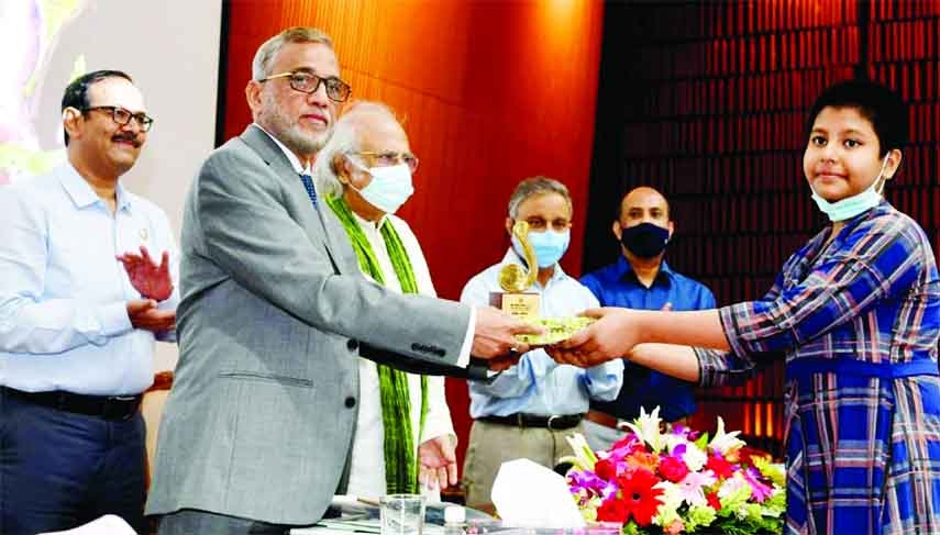 Environment, Forest and Climate Change Minister Shahab Uddin distributes prizes among the recipients on the occasion of World Environment Day in the auditorium of Environment Directorate in the city on Thursday.