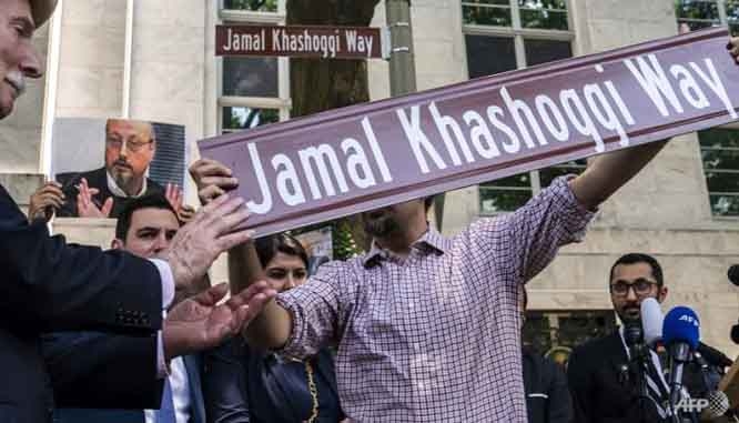 Human rights organisations celebrate the unveiling of 'Jamal Khashoggi Way' outside of the Embassy of Saudi Arabia in honour of the murdered Saudi-born journalist Jamal Khashoggi, in Washington, US, on Wednesday.