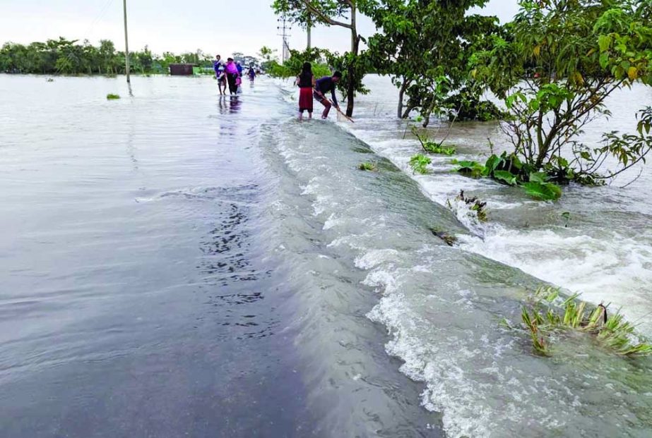 A low-lying area of Bishwamvarpur in Tahirpur upazila under Sunamganj district was inundated on Thursday due to incessant rain and onrush of hill water. NN photo