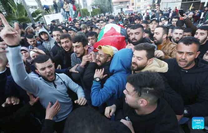 The determined Palestinians carrying corps of the fellows killed by the Israeli forces in Jenin on Friday.